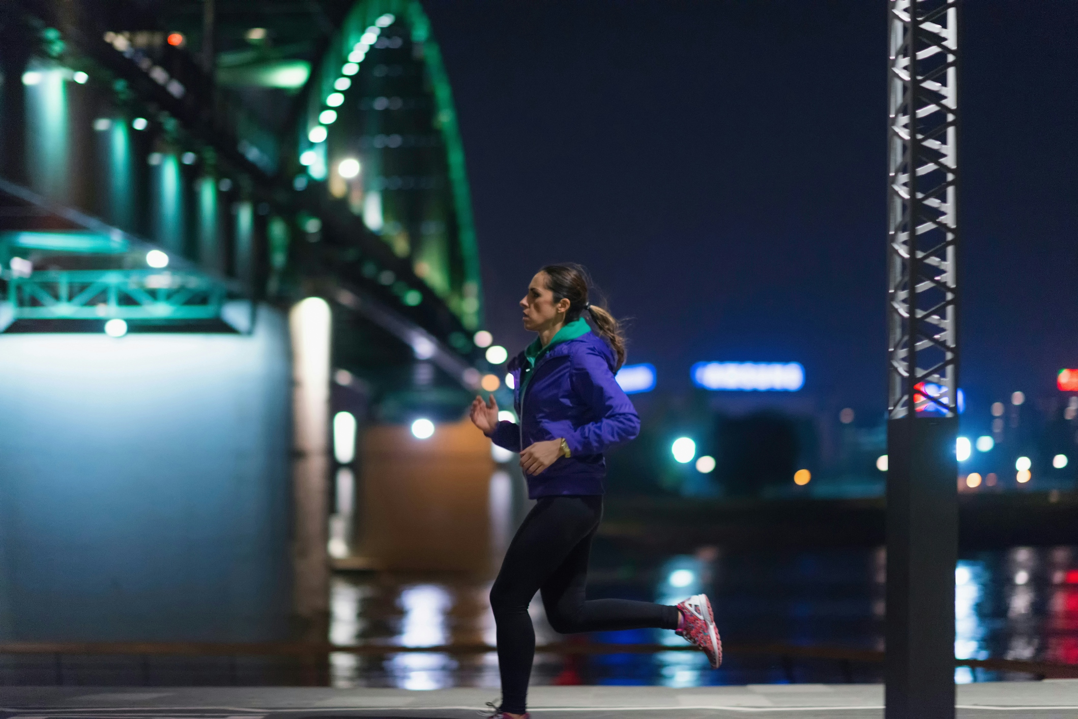 Woman running at night