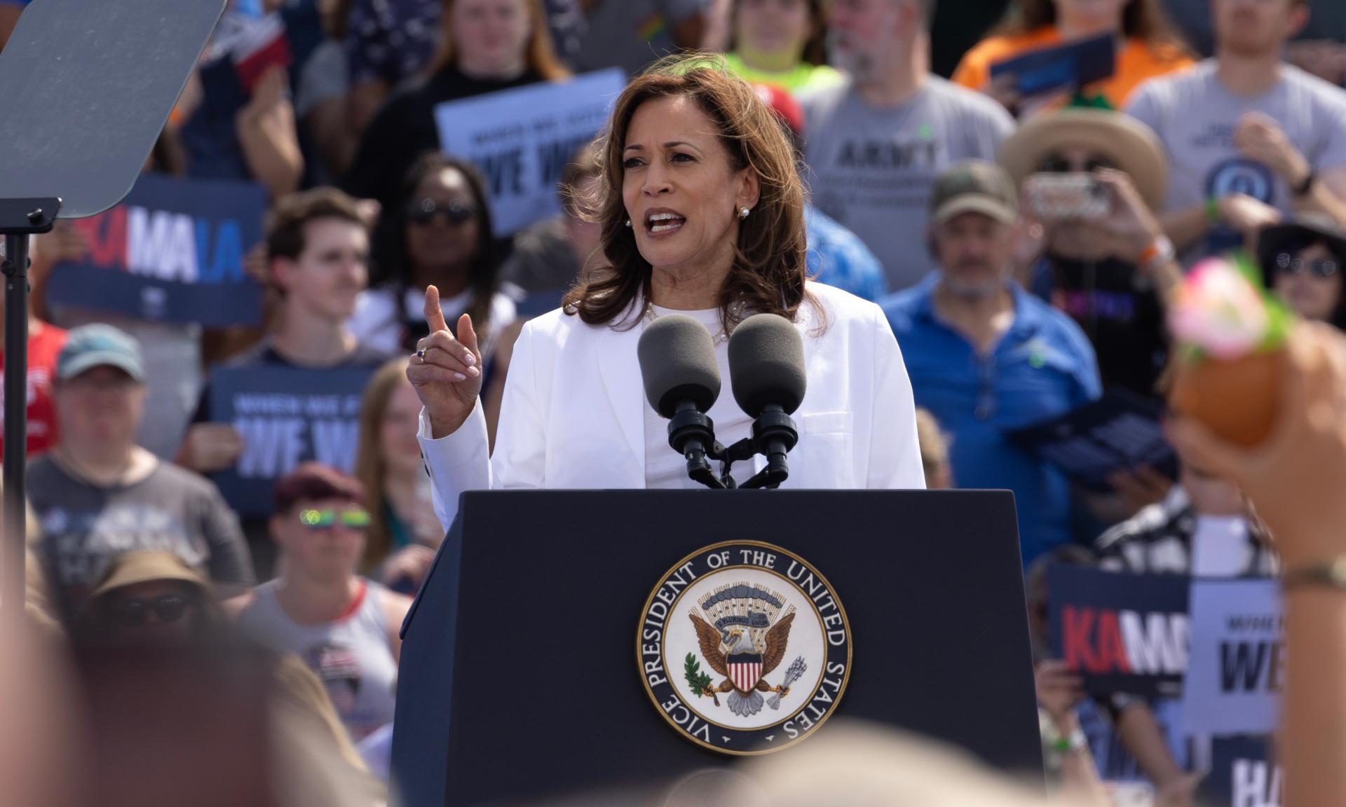 Democratic presidential candidate Vice President Kamala Harris speaks at a campaign rally where she appeared with her running mate Democratic vice presidential candidate, Minnesota Gov. Tim Walz on August 7, 2024 in Eau Claire, Wisconsin