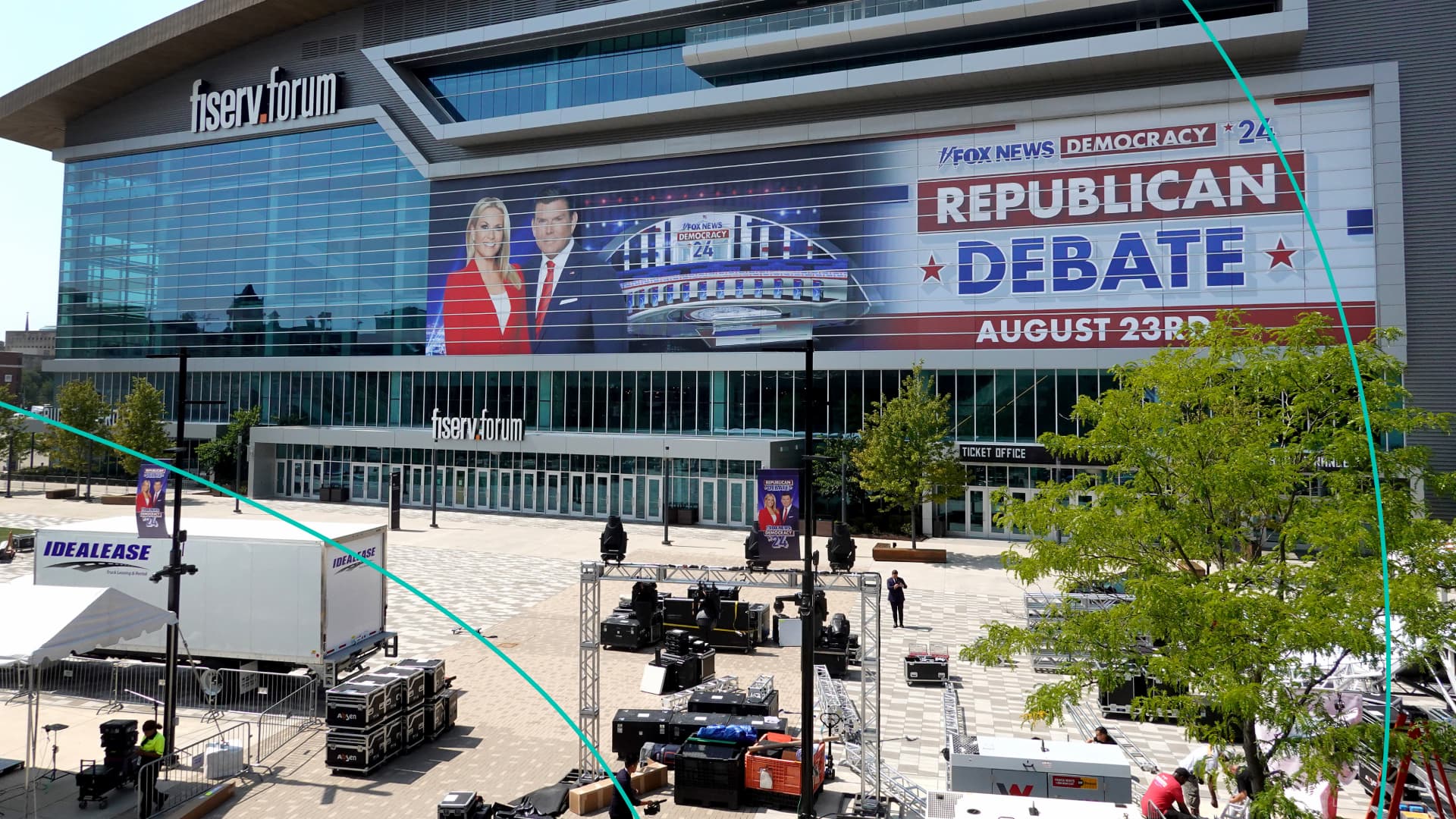 upporters of Republican presidential candidate former President Donald Trump carry signs around the Fiserv Forum on August 22, 2023 in Milwaukee, Wisconsin