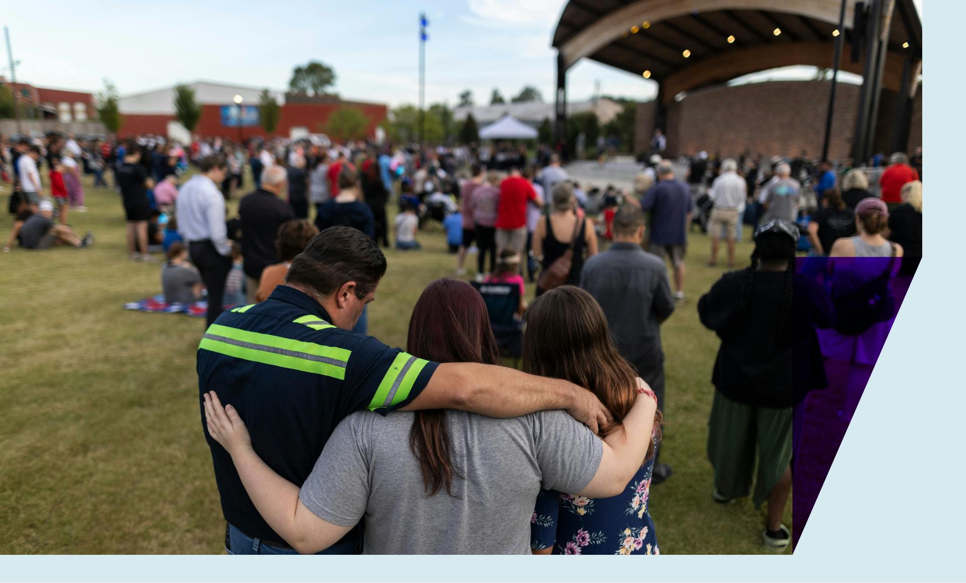 A crowd huddles together after a shooting at Apalachee High School