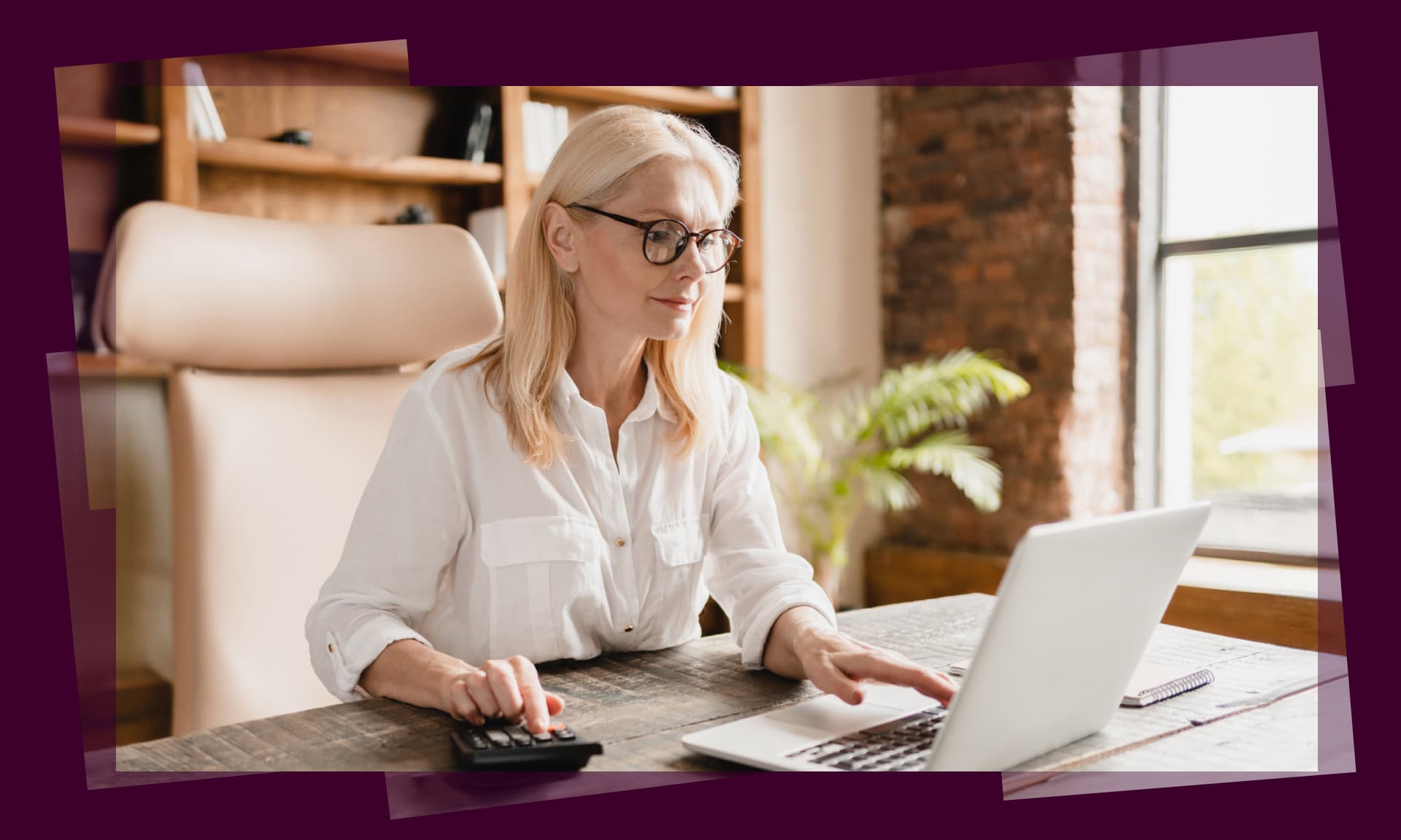 woman working at desk stock image