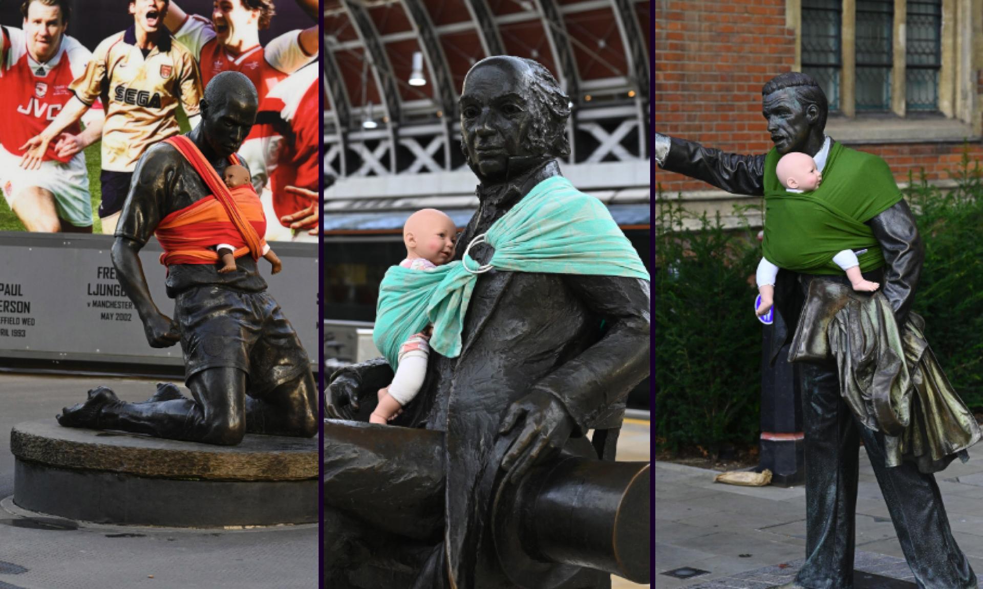 male statues with babydolls strapped in carriers