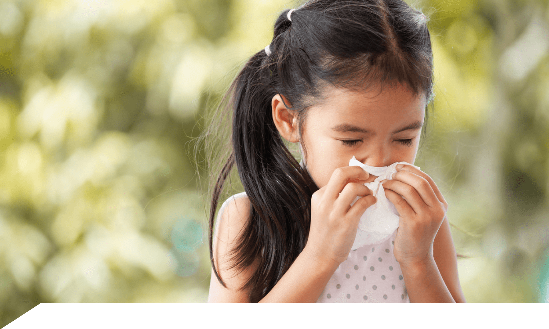 girl sneezing