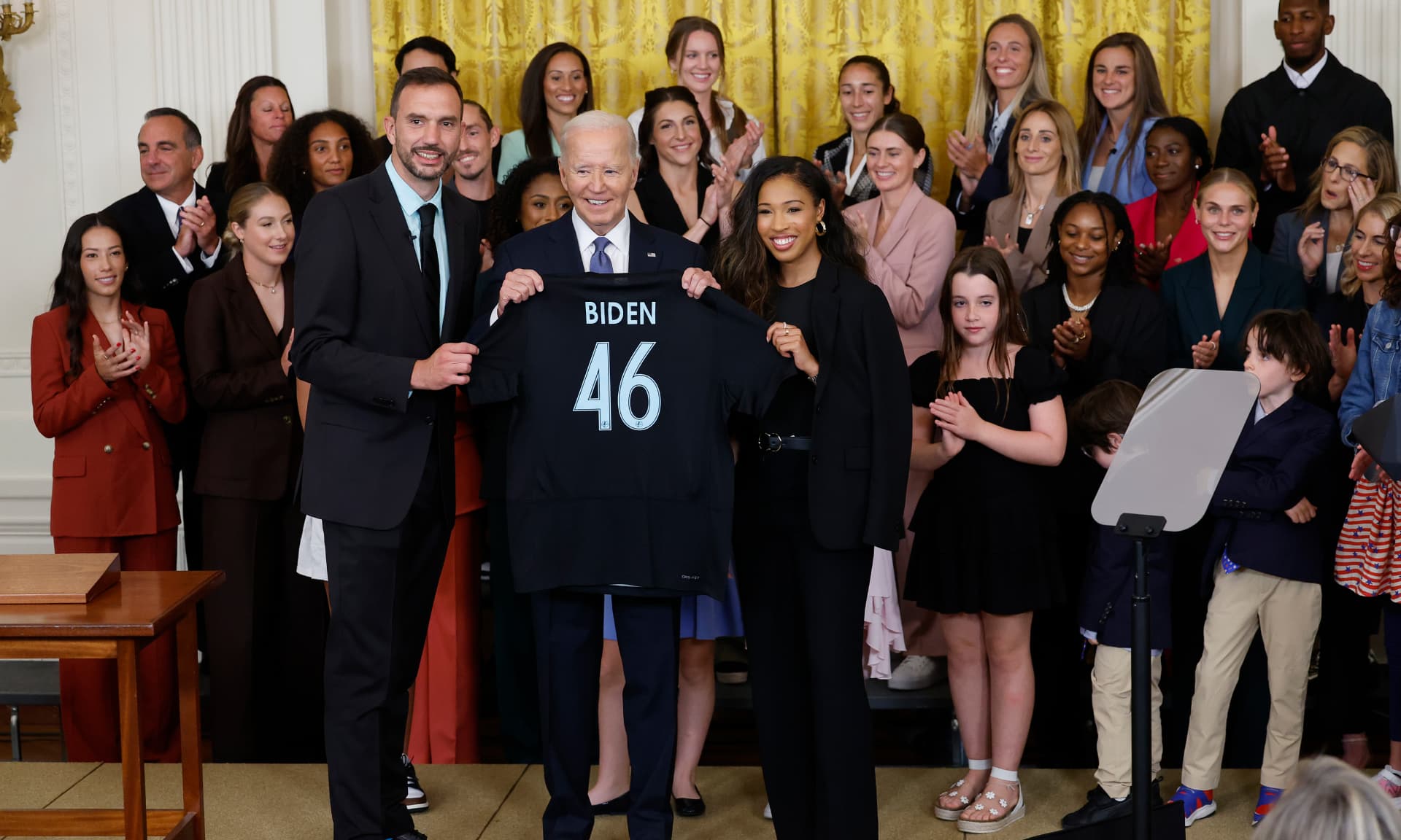 Biden and a woman's soccer team