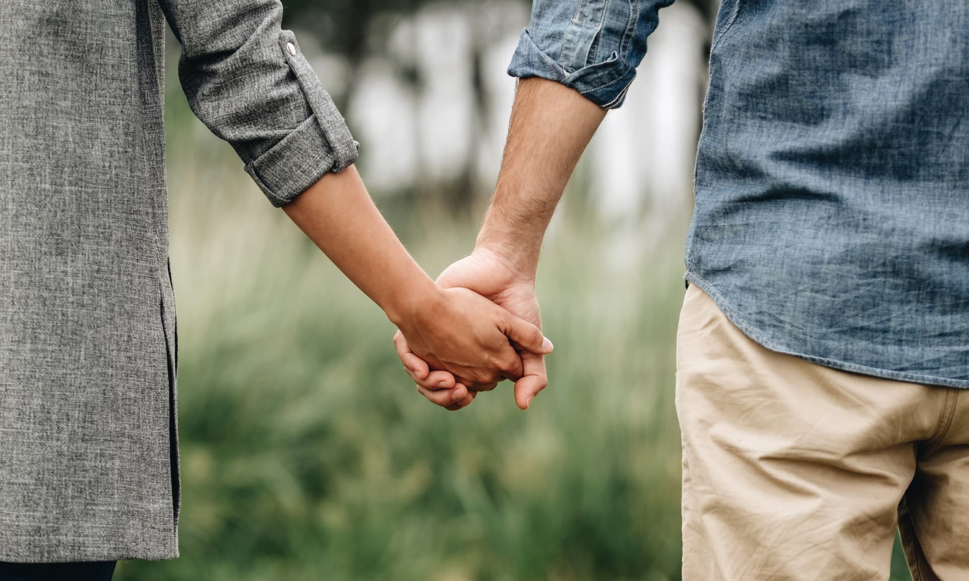 Couple holding hands 