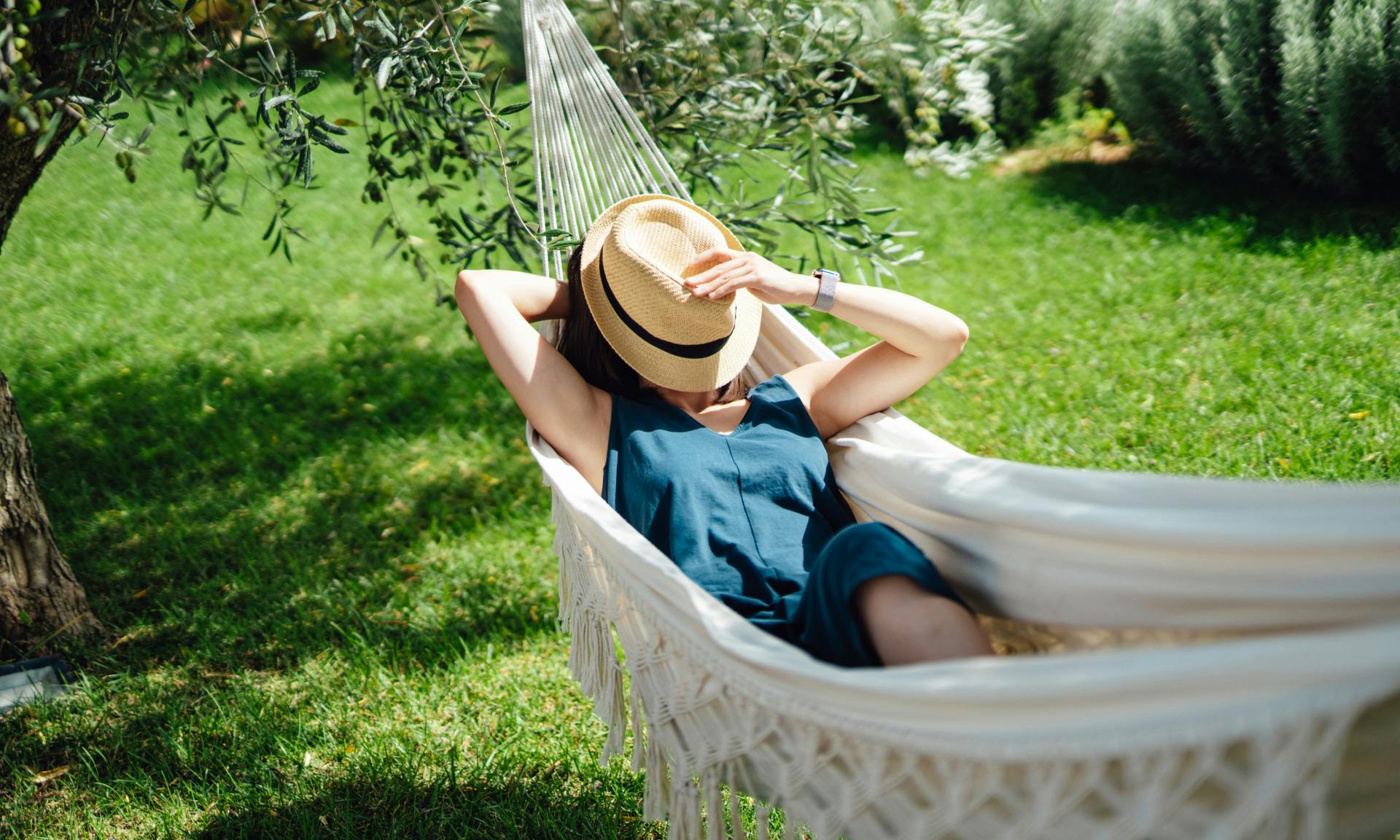 A woman relaxing in a hammock