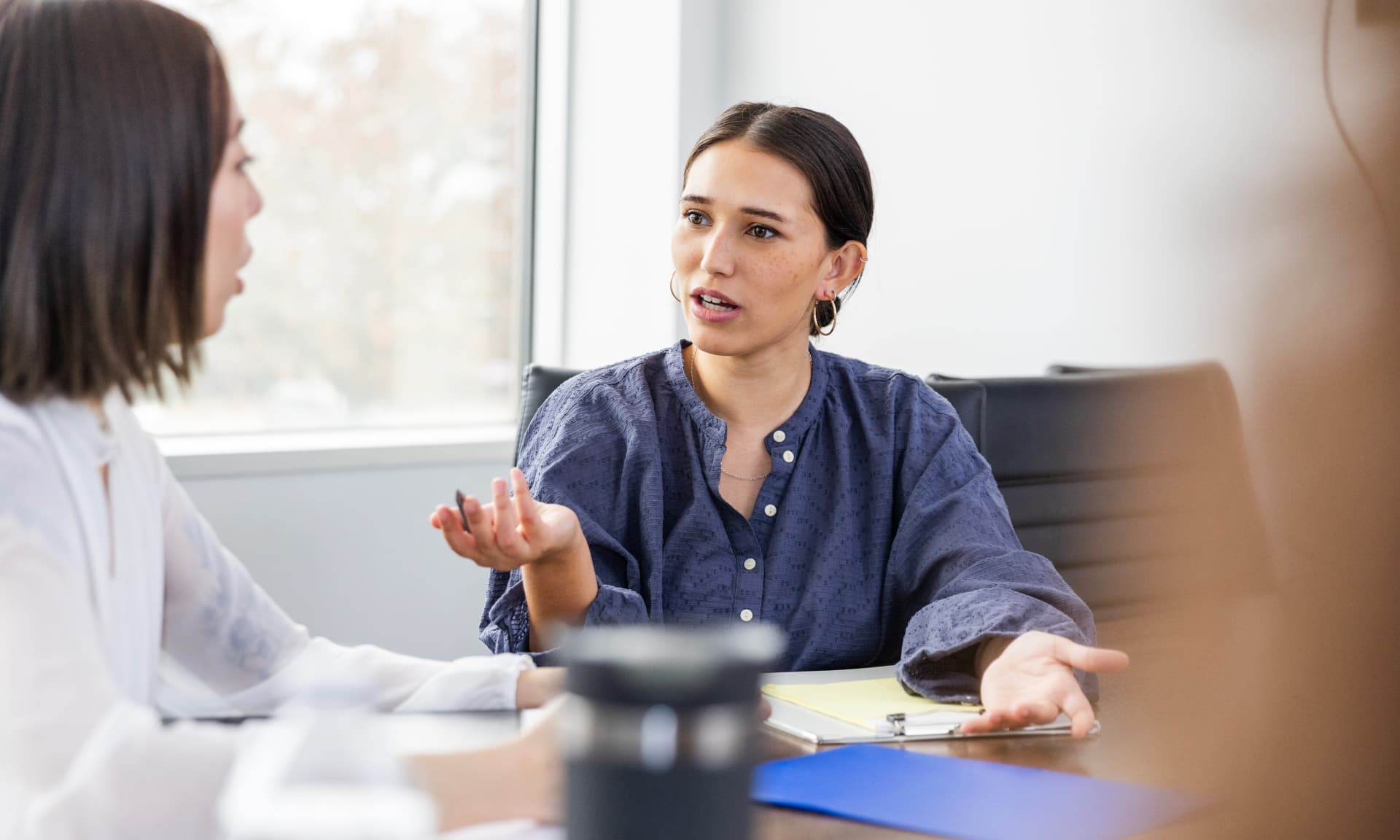 Two female coworkers having a disagreement