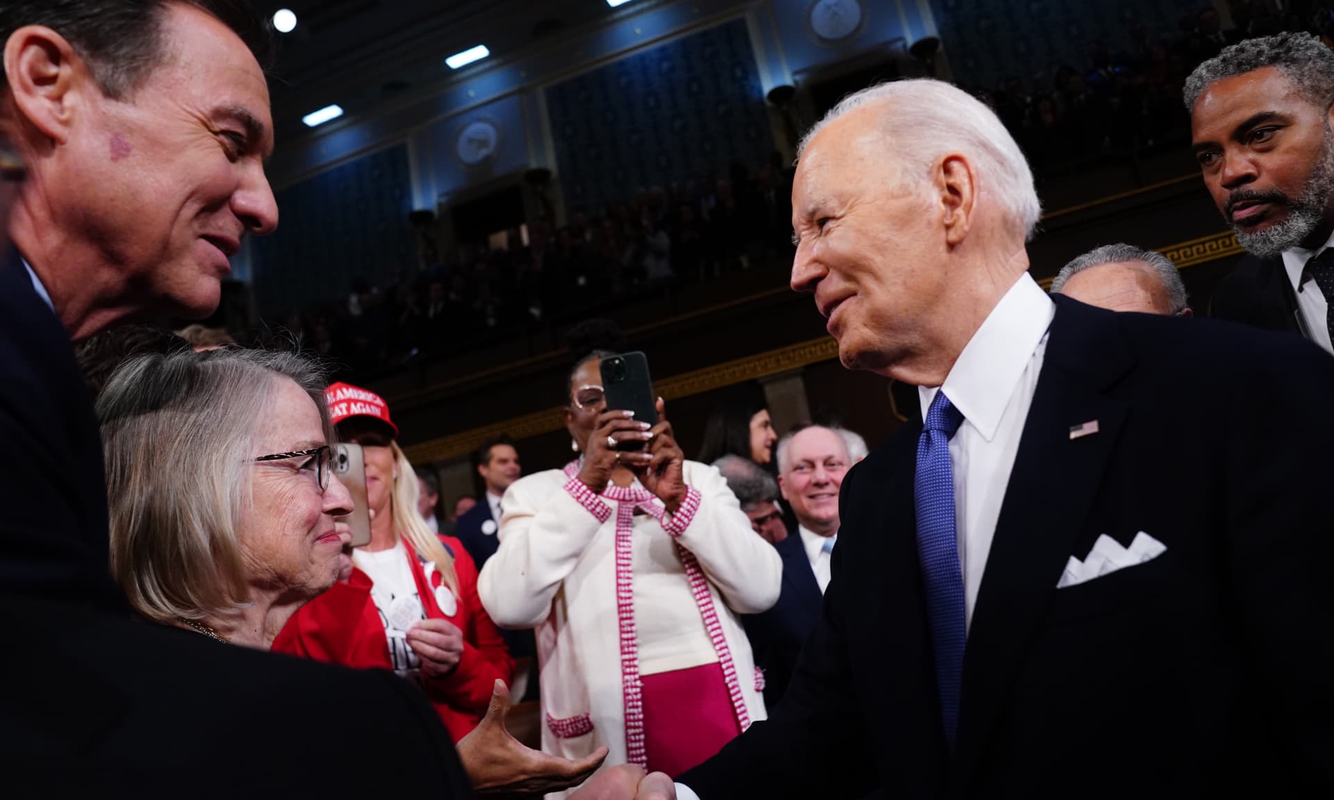 President Joe Biden enters the House chamber to deliver the annual State of the Union address