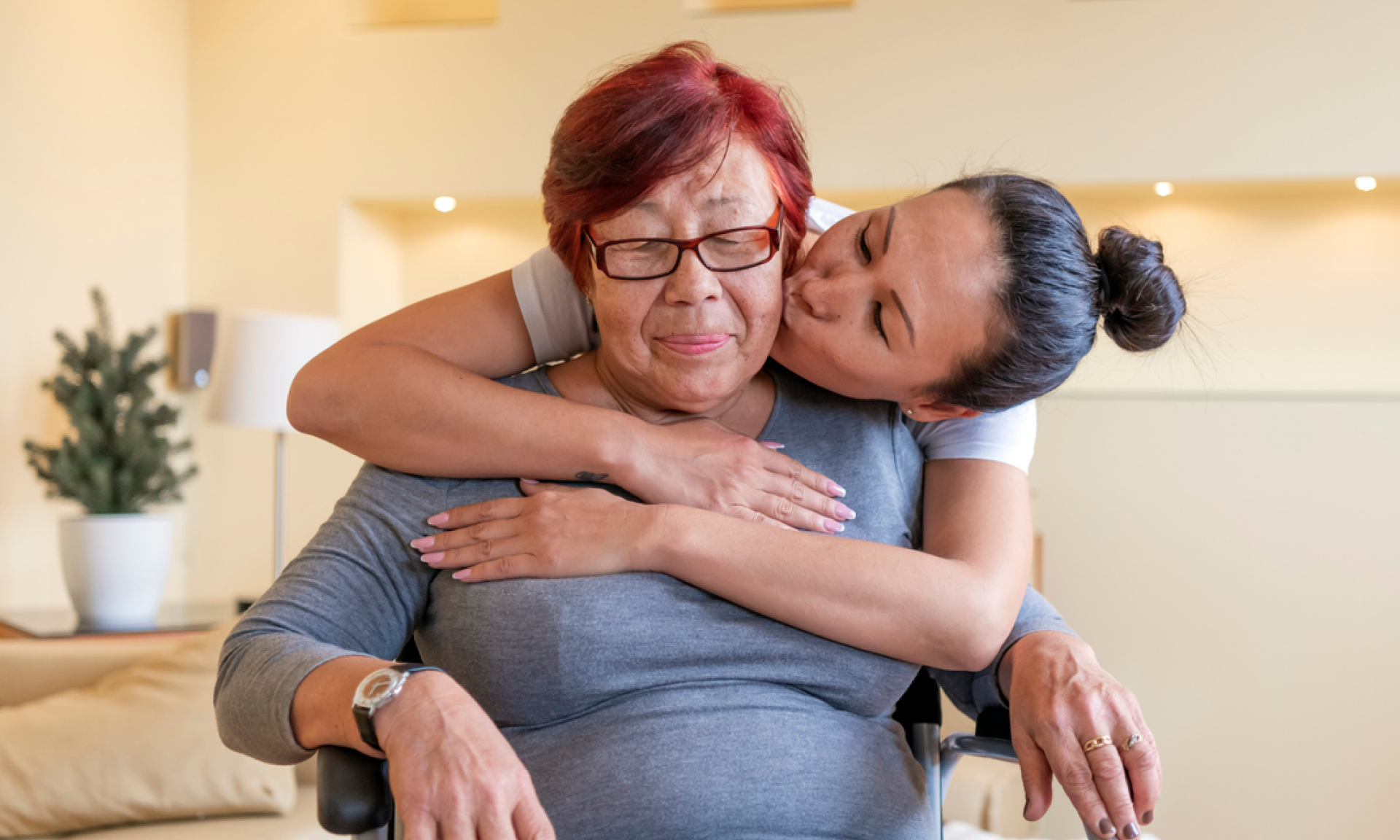 A woman hugging her mom