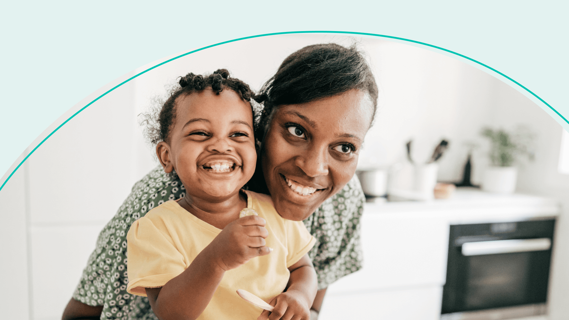 mom and daughter laughing