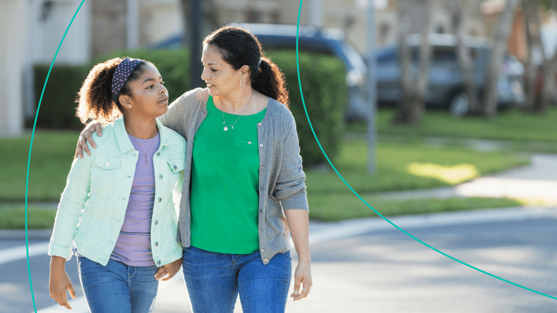 Mother and daughter having a serious conversation while walking.