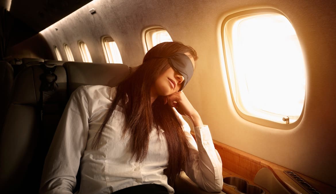 Featured image for Is It a Good Idea to Take Melatonin or a Sleeping Pill on a Plane? Here’s What Sleep Doctors Have to Say