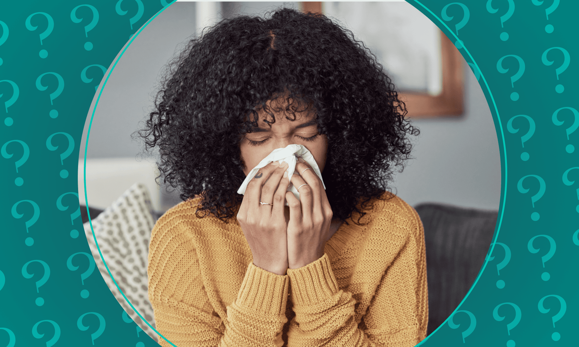 Woman blowing her nose