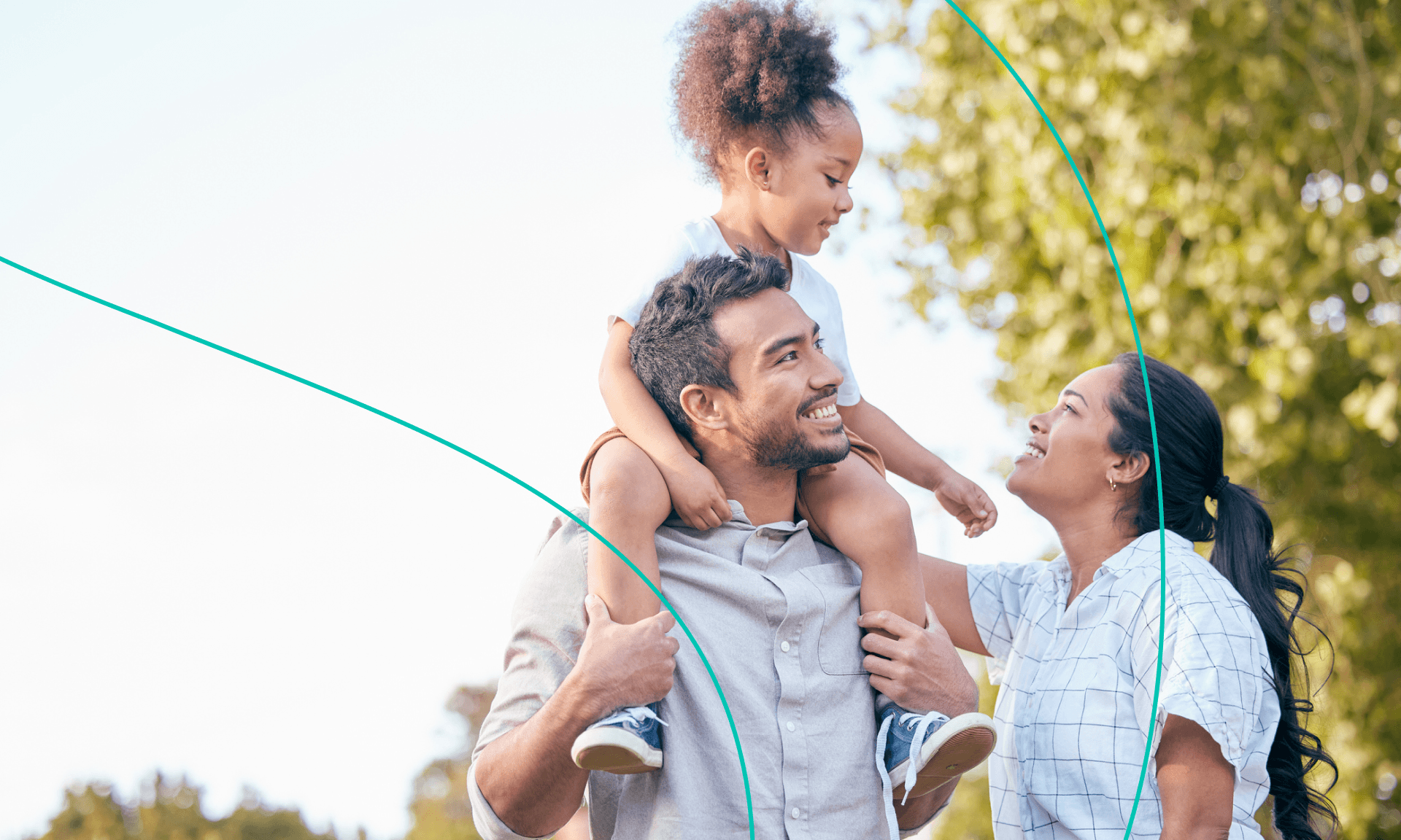little girl on dad's shoulders with mom