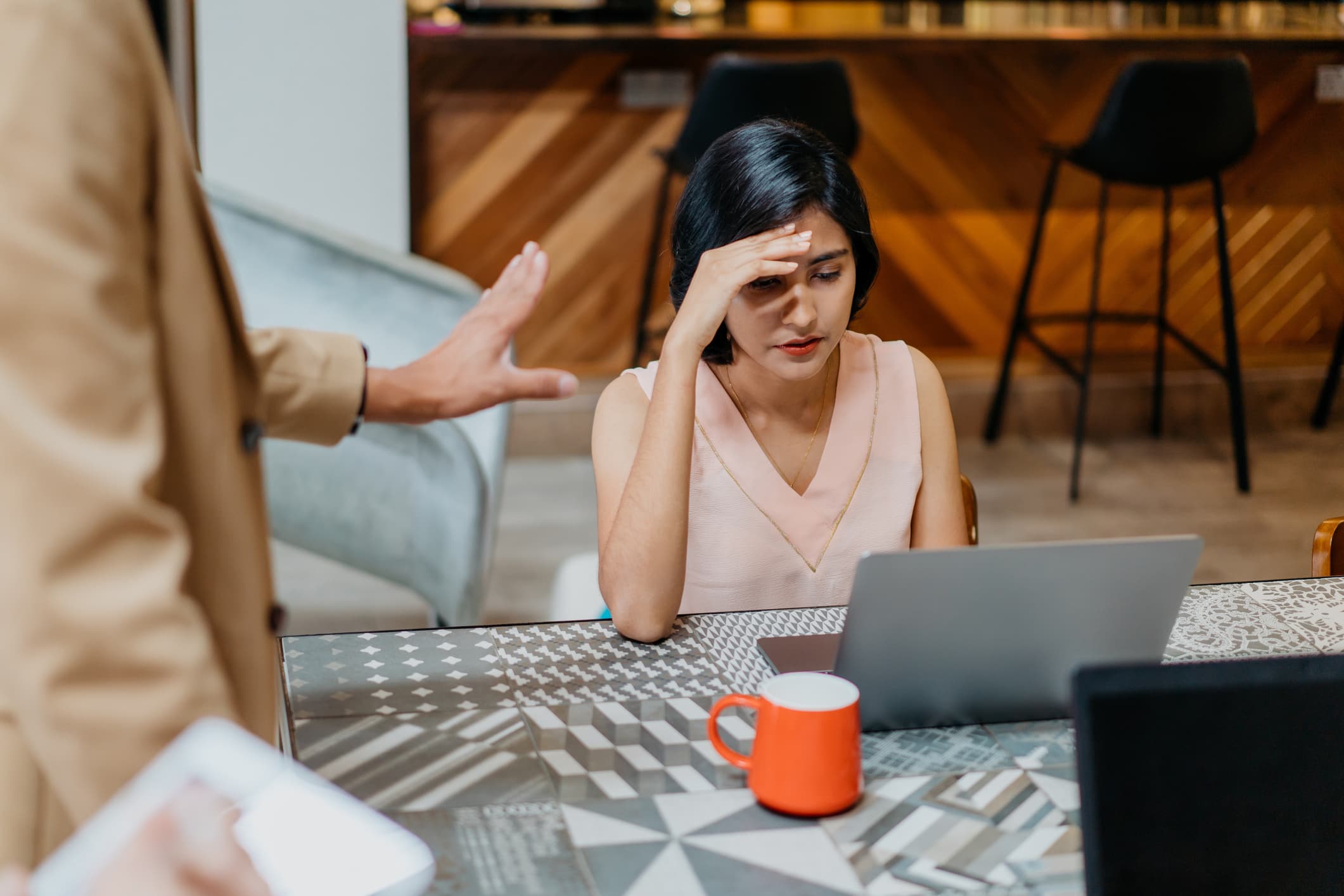 Woman sad in front of computer